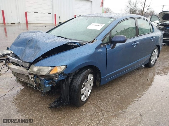2010 Honda Civic Sdn LX with VIN 19XFA1F51AE015941, listed as a IAAI auction lot 41710847 with 133,929 mi miles. Bid and sale history available at carsss.com. Image 2.