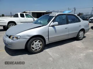 2000 Toyota Corolla VE с VIN 1NXBR12EXYZ359157, выставлен на аукционе Copart как лот 60569095 с пробегом 177 295 миль миль и Списание • Salvage title. История ставок и продаж доступна на DreamBid. Изображение 1.