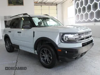2021 Ford Bronco Sport Big Bend z VIN 3FMCR9B60MRB04059, wystawiony jako Copart lot #57158195 z przebiegiem 32 298 mil mil oraz Szkoda całkowita • Salvage title. Historia ofert i sprzedaży dostępna na DreamBid. Obrazek 1.