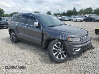 2017 Jeep Grand Cherokee Overland z VIN 1C4RJFCG1HC684826, wystawiony jako Copart lot #59971595 z przebiegiem 101 765 mil mil oraz Szkoda całkowita • Salvage title. Historia ofert i sprzedaży dostępna na DreamBid. Obrazek 4.