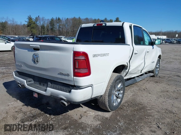 2022 Ram 1500 Laramie with VIN 1C6SRFJTXNN237199, listed as a IAAI auction lot 41705536 with 35,143 mi miles and . Bid and sale history available at DreamBid. Image 4.