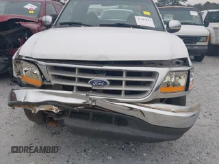 1999 Ford F-150 with VIN 1FTZX1728XNA81813, listed as a IAAI auction lot 41367154 with 149,103 mi miles and . Bid and sale history available at DreamBid. Image 6.