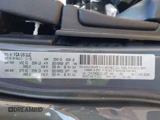 2019 Jeep Grand Cherokee Laredo E with VIN 1C4RJFAG2KC611457, listed as a IAAI auction lot 42212982 with 97,603 mi miles and . Bid and sale history available at DreamBid. Image 9.