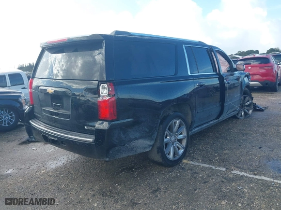 2018 Chevrolet Suburban Premier with VIN 1GNSCJKC2JR199702, listed as a IAAI auction lot 41136128 with 80,103 mi miles. Bid and sale history available at carsss.com. Image 4.