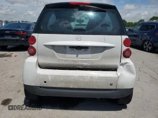 2009 Smart fortwo Pure z VIN WMEEJ31X99K218439, wystawiony jako Copart lot #57567355 z przebiegiem 157 281 mil mil oraz Szkody całkowita. Historia ofert i sprzedaży dostępna na DreamBid. Obrazek 6.