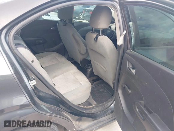 2013 Chevrolet Sonic LS with VIN 1G1JA5SH4D4138164, listed as a IAAI auction lot 42677319 with 144,244 mi miles and . Bid and sale history available at DreamBid. Image 8.