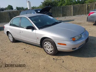 2001 Saturn SL z VIN 1G8ZK52771Z269242, wystawiony jako IAAI lot #42425226 z przebiegiem 129 539 mil mil oraz . Historia ofert i sprzedaży dostępna na DreamBid. Obrazek 1.