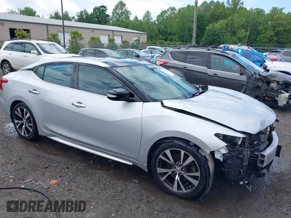 2016 Nissan Maxima SV with VIN 1N4AA6AP5GC900892, listed as a IAAI auction lot 42139043 with 325,228 mi miles and . Bid and sale history available at DreamBid. Image 1.