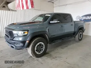 2021 Ram 1500 with VIN 0K1905786880, listed as a Copart auction lot 61756114 with 34,927 mi miles and Clean title. Bid and sale history available at DreamBid. Image 1.