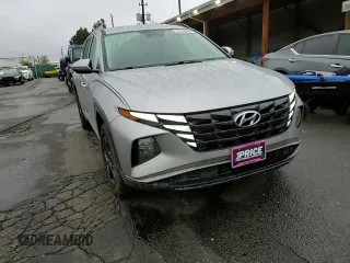 2023 Hyundai Tucson SEL z VIN 5NMJBCAE1PH195028, wystawiony jako Copart lot #53737085 z przebiegiem 61 640 mil mil oraz Szkoda całkowita • Salvage title. Historia ofert i sprzedaży dostępna na DreamBid. Obrazek 11.