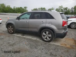 2012 Kia Sorento EX z VIN 5XYKU4A68CG209833, wystawiony jako Copart lot #53942035 z przebiegiem 216 199 mil mil oraz Szkoda całkowita • Salvage title. Historia ofert i sprzedaży dostępna na DreamBid. Obrazek 2.
