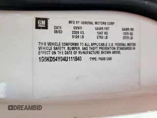 2004 Cadillac DeVille z VIN 1G6KD54Y04U111840, wystawiony jako Copart lot #56712195 z przebiegiem 60 378 mil mil oraz Szkody całkowita. Historia ofert i sprzedaży dostępna na DreamBid. Obrazek 12.