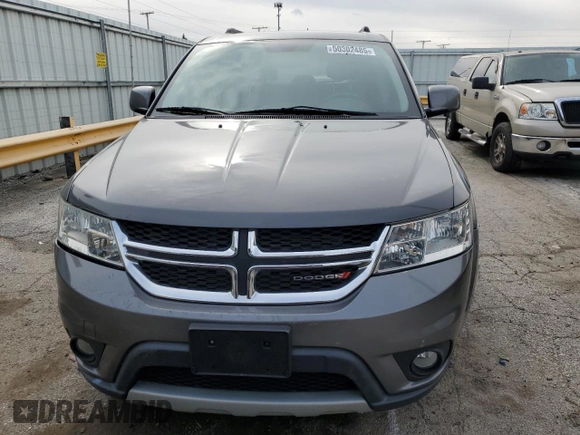 2013 Dodge Journey SXT with VIN 3C4PDCBG5DT695888, listed as a Copart auction lot 50302485 with 126,720 mi miles and Salvage Title. Bid and sale history available at DreamBid. Image 5.