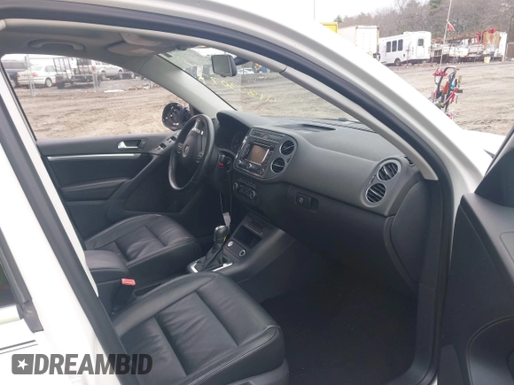 2012 Volkswagen Tiguan S with VIN WVGBV7AX0CW543697, listed as a IAAI auction lot 41853077 with 113,002 mi miles and . Bid and sale history available at DreamBid. Image 5.