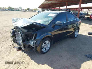 2014 Chevrolet Sonic LT z VIN 1G1JC5SB7E4204374, wystawiony jako IAAI lot #41642630 z przebiegiem 100 282 mil mil oraz . Historia ofert i sprzedaży dostępna na DreamBid. Obrazek 17.