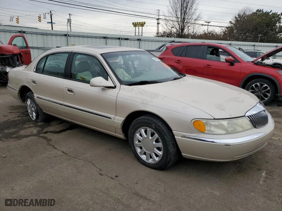 2001 Lincoln Continental with VIN 1LNHM97V11Y681989, listed as a Copart auction lot 46539725 with 107,130 mi miles and Salvage Title. Bid and sale history available at carsss.com. Image 4.