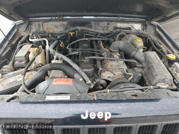 1998 Jeep Cherokee Sport z VIN 1J4FJ68S8WL183519, wystawiony jako Copart lot #60976335 z przebiegiem 161 536 mil mil oraz Czysty tytuł • Clean title. Historia ofert i sprzedaży dostępna na DreamBid. Obrazek 12.