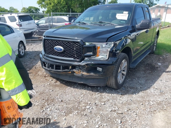 2018 Ford F-150 XL with VIN 1FTEX1CPXJKE63642, listed as a IAAI auction lot 42768090 with 147,219 mi miles and . Bid and sale history available at DreamBid. Image 6.