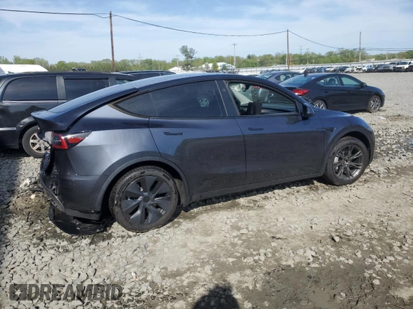 2024 Tesla Model Y Long Range with VIN 7SAYGDEE7RA307013, listed as a Copart auction lot 54767595 with 12,953 mi miles and Salvage Title. Bid and sale history available at DreamBid. Image 3.