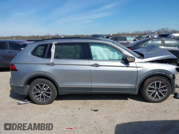 2021 Volkswagen Tiguan SE with VIN 3VV3B7AXXMM116774, listed as a IAAI auction lot 41868796 with Not Provided miles and . Bid and sale history available at DreamBid. Image 12.