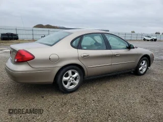 2003 Ford Taurus SE Standard with VIN 1FAFP53U03A252904, listed as a Copart auction lot 82175794 with 156,490 mi miles and Salvage Title. Bid and sale history available at carsss.com. Image 3.