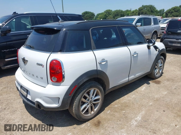 2014 MINI Countryman S with VIN WMWZC3C54EWP27859, listed as a IAAI auction lot 39592610 with 105,264 mi miles and . Bid and sale history available at DreamBid. Image 4.