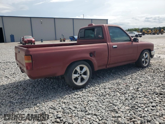 1994 Toyota Pickup DLX with VIN 4TARN81P3RZ163491, listed as a Copart auction lot 65920015 with 212,592 mi miles and Clean title. Bid and sale history available at DreamBid. Image 3.
