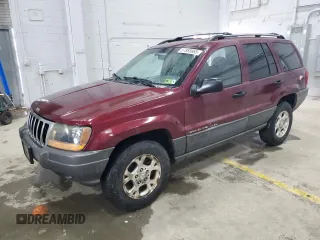 2001 Jeep Grand Cherokee Laredo z VIN 1J4GW48S11C618478, wystawiony jako Copart lot #57889965 z przebiegiem Nie podano mil oraz Czysty tytuł • Clean title. Historia ofert i sprzedaży dostępna na DreamBid. Obrazek 1.