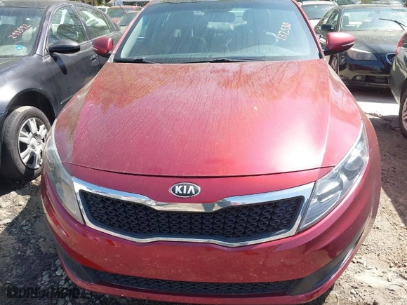 2013 Kia Optima SX w/Limited Pkg with VIN 5XXGR4A66DG137530, listed as a IAAI auction lot 41940486 with 124,605 mi miles. Bid and sale history available at carsss.com. Image 6.
