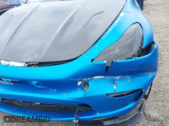 2021 Tesla Model Y Performance z VIN 5YJYGDEF8MF209819, wystawiony jako IAAI lot #41757009 z przebiegiem 37 685 mil mil oraz . Historia ofert i sprzedaży dostępna na DreamBid. Obrazek 21.