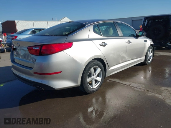 2015 Kia Optima LX with VIN 5XXGM4A71FG484306, listed as a IAAI auction lot 41797482 with 116,181 mi miles and . Bid and sale history available at carsss.com. Image 4.