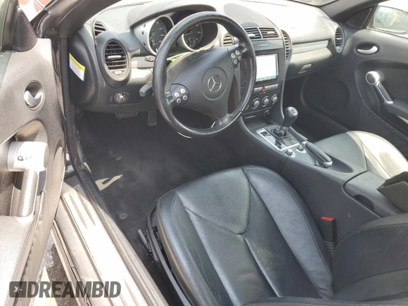 2007 Mercedes-Benz SLK-Class 3.0L with VIN WDBWK54F57F157433, listed as a Copart auction lot 66233794 with 104,198 mi miles and Salvage Title. Bid and sale history available at carsss.com. Image 8.