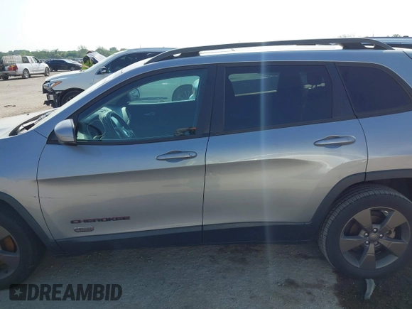 2016 Jeep Cherokee Latitude with VIN 1C4PJLCB7GW256587, listed as a IAAI auction lot 42037539 with 209,267 mi miles. Bid and sale history available at carsss.com. Image 14.