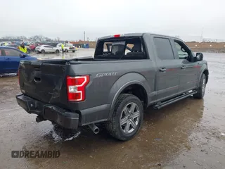 2019 Ford F-150 XL with VIN 1FTEW1C56KKC31025, listed as a IAAI auction lot 41452618 with 153,422 mi miles and . Bid and sale history available at DreamBid. Image 4.