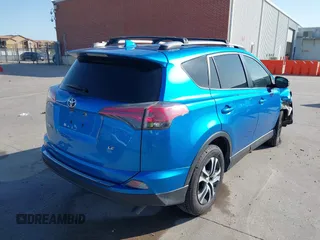 2017 Toyota RAV4 LE with VIN JTMZFREV4HJ115558, listed as a IAAI auction lot 41999381 with 94,223 mi miles and . Bid and sale history available at carsss.com. Image 4.