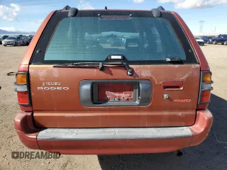 1999 Isuzu Rodeo S with VIN 4S2CM58WXX4318576, listed as a Copart auction lot 44378265 with 258,981 mi miles and Salvage Title. Bid and sale history available at DreamBid. Image 6.