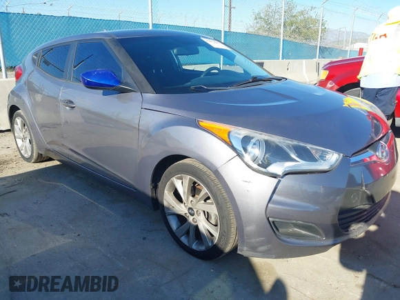 2016 Hyundai Veloster with VIN KMHTC6AD3GU283985, listed as a IAAI auction lot 41872103 with 153,949 mi miles. Bid and sale history available at carsss.com. Image 1.