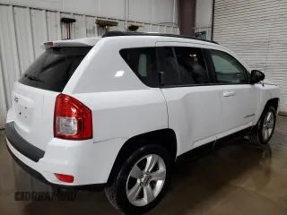 2013 Jeep Compass Sport with VIN 1C4NJDBB3DD271450, listed as a Copart auction lot 50958575 with 90,607 mi miles and Salvage Title. Bid and sale history available at carsss.com. Image 3.