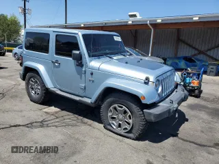 2012 Jeep Wrangler Arctic z VIN 1C4AJWBGXCL156600, wystawiony jako Copart lot #56369065 z przebiegiem 216 808 mil mil oraz Szkoda całkowita • Salvage title. Historia ofert i sprzedaży dostępna na DreamBid. Obrazek 4.