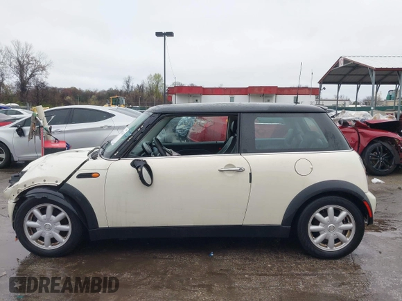 2004 MINI Hardtop with VIN WMWRC33434TJ60941, listed as a IAAI auction lot 39078161 with 143,107 mi miles and . Bid and sale history available at DreamBid. Image 15.