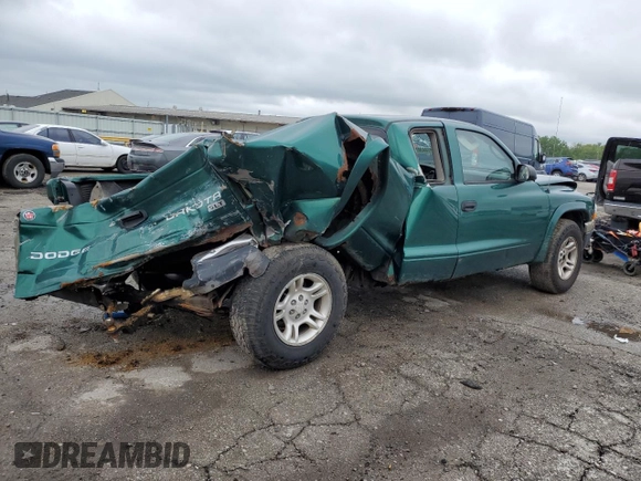 2004 Dodge Dakota SLT с VIN 1D7GL42K04S612274, выставлен на аукционе Copart как лот 57443075 с пробегом 258 513 миль миль и Списание • Salvage title. История ставок и продаж доступна на DreamBid. Изображение 3.