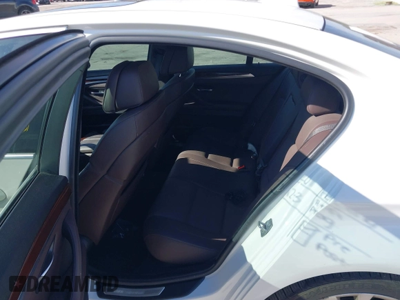 2013 BMW 5 Series 535i with VIN WBAFR7C59DC827660, listed as a IAAI auction lot 41047642 with 131,917 mi miles and . Bid and sale history available at DreamBid. Image 8.