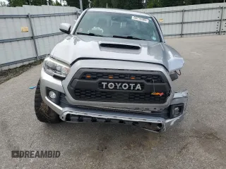 2019 Toyota Tacoma SR with VIN 3TMCZ5AN2KM193701, listed as a Copart auction lot 56776385 with 112,990 mi miles and Salvage title. Bid and sale history available at DreamBid. Image 5.