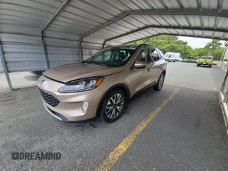 2020 Ford Escape Titanium Hybrid with VIN 1FMCU0DZ5LUB81972, listed as a IAAI auction lot 42679188 with 19,400 mi miles and . Bid and sale history available at DreamBid. Image 14.