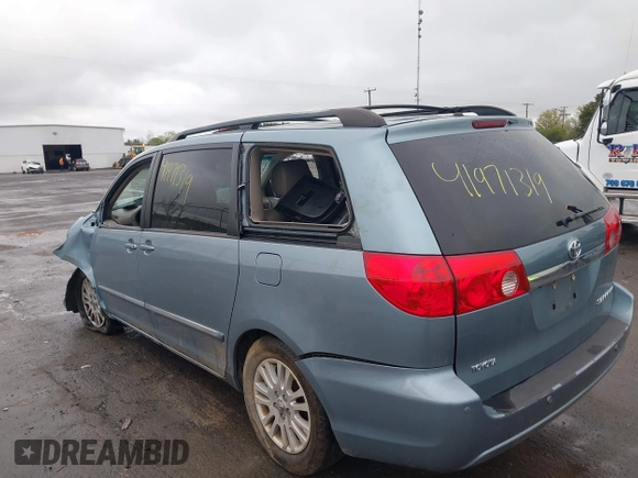 2008 Toyota Sienna XLE with VIN 5TDZK22C48S153784, listed as a IAAI auction lot 41971319 with 126,071 mi miles. Bid and sale history available at carsss.com. Image 3.
