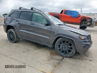 2018 Jeep Grand Cherokee Altitude with VIN 1C4RJFAG0JC250082, listed as a Copart auction lot 55940135 with 79,523 mi miles and Salvage title. Bid and sale history available at DreamBid. Image 4.