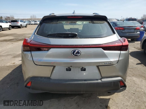 2021 Lexus UX 250h z VIN JTHP9JBH7M2048892, wystawiony jako Copart lot #52604065 z przebiegiem 46 202 mil mil oraz Czysty tytuł • Clean title. Historia ofert i sprzedaży dostępna na DreamBid. Obrazek 6.