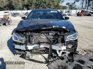 2016 BMW M5 with VIN WBSFV9C57GD595447, listed as a Copart auction lot 41343845 with 50,029 mi miles and Salvage Title. Bid and sale history available at carsss.com. Image 5.