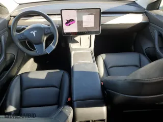 2021 Tesla Model 3 Standard Range Plus with VIN 5YJ3E1EA9MF872920, listed as a Copart auction lot 83625474 with 62,507 mi miles and Salvage Title. Bid and sale history available at carsss.com. Image 8.