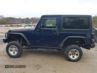 2013 Jeep Wrangler Rubicon 10th Anniversary with VIN 1C4BJWCG7DL544145, listed as a IAAI auction lot 41965259 with 125,900 mi miles and . Bid and sale history available at carsss.com. Image 15.